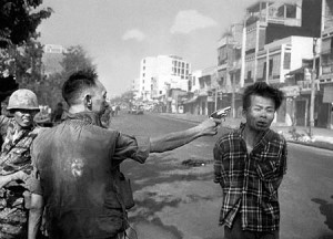 South Vietnamese National Police Chief Brig Gen. Nguyen Ngoc Loan executes a Viet Cong officer with a single pistol shot in the head in Saigon, Vietnam on Feb. 1, 1968.  The photo,  by photojournalist Eddie Adams, became one of the Vietnam's War's most indelible images,  winning a Pultizer Prize in 1969. 