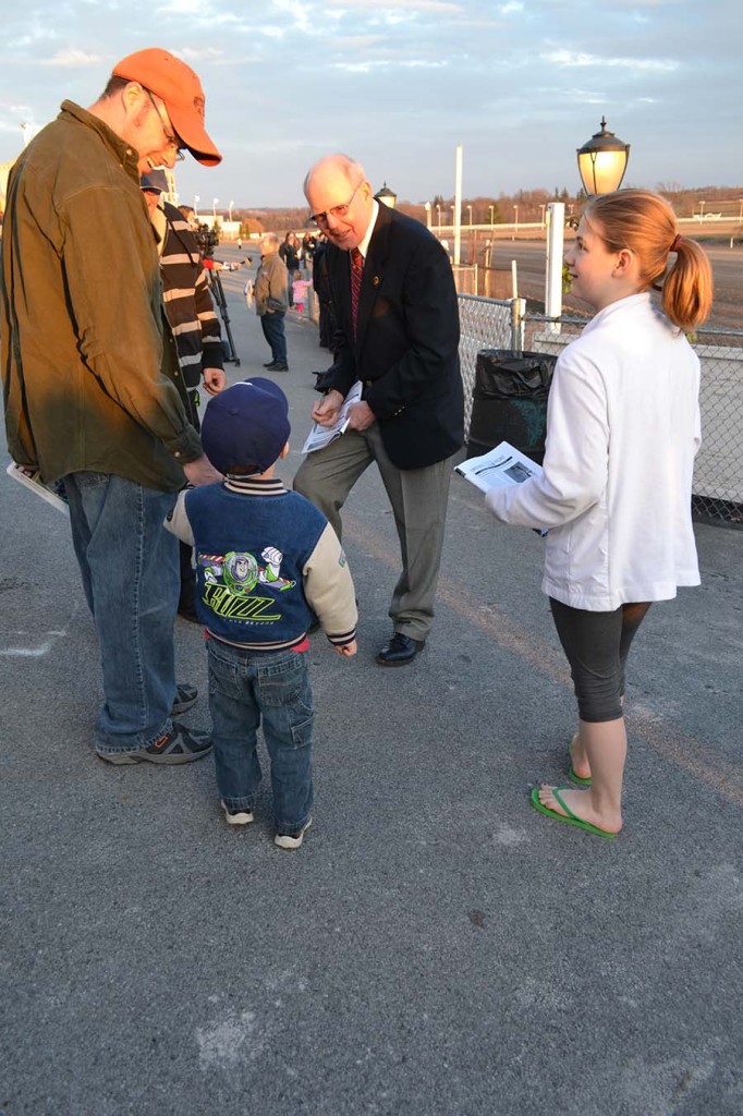 Jim Moran greets a young fan. Photo: Bill DeLapp | Syracuse New Times 