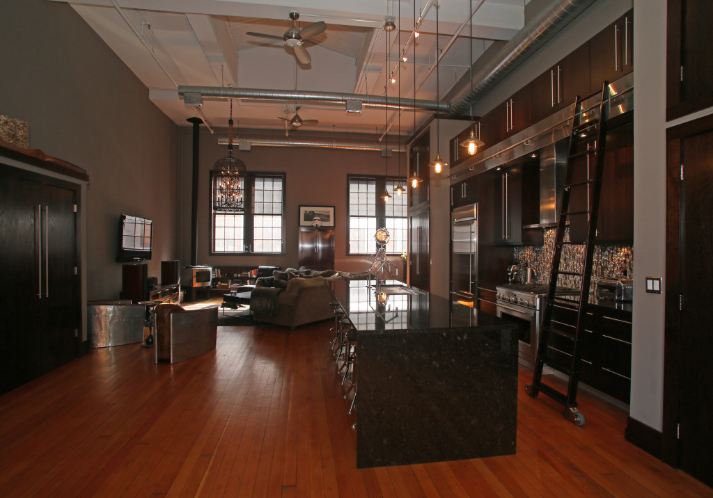 The third-floor condo in the former Firehouse No. 1 across from City Hall was once a handball court for firefighters.