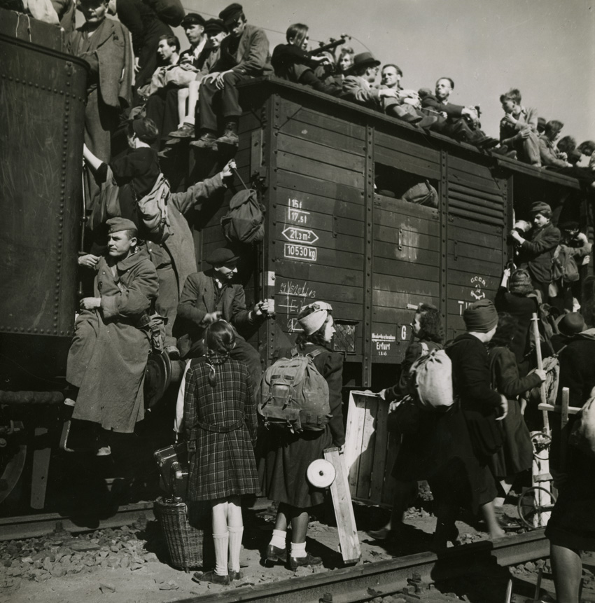 Overcrowded train waiting to depart from Anhalter Bahnhof, Berlin Germany (August, 1945). 