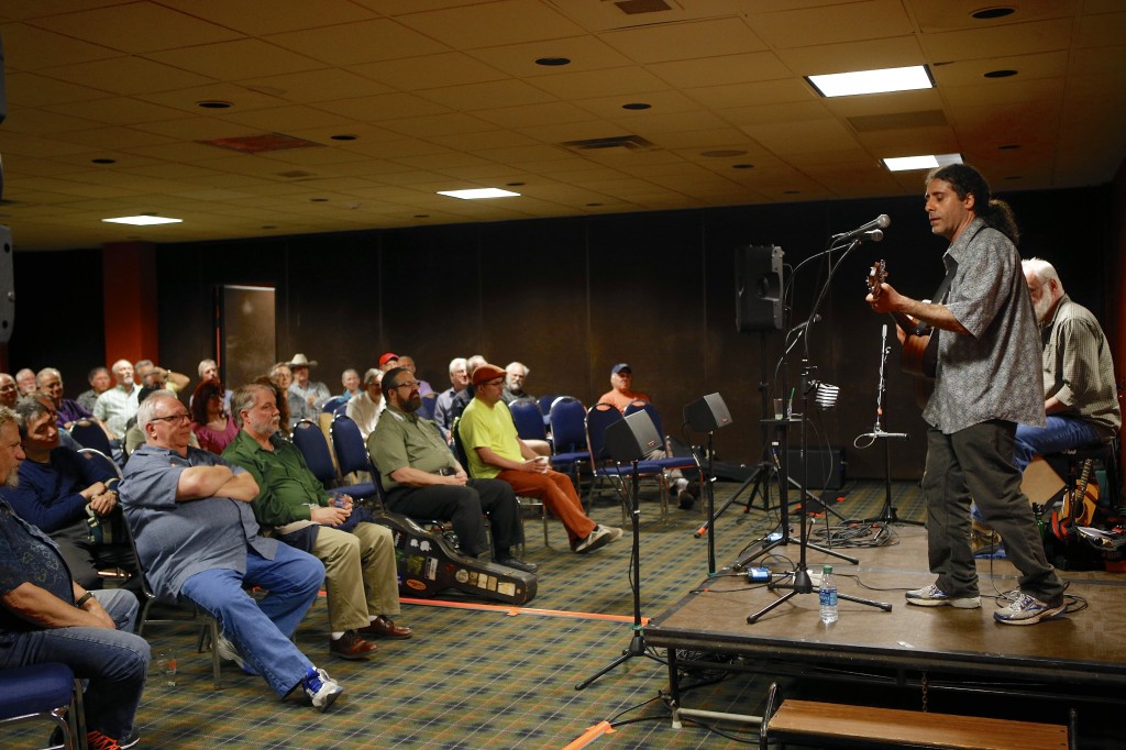 Mark Zane entertains at a recent meeting. Michael Davis Photo | Syracuse New Times