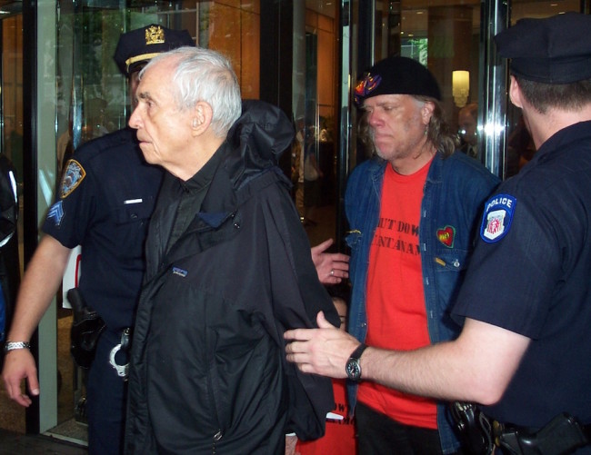 Daniel Berrigan being arrested for civil disobedience. Photo by Thomas Good via Wikimedia Commons 