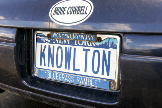 Bill Knowltons license plate, which reads "Knowlton" in the middle with a "Bluegrass Ramble" cover.