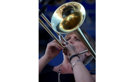 Melissa Gardiner plays trombone.