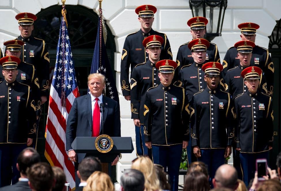 President Donald Trump during the singing of God Bless America during a "Celebration of America" event in the Rose Garden of the White House, June 5, 2018. The Philadelphia Eagles had been scheduled to attend a celebration of their Super Bowl victory at the White House on Tuesday afternoon. But in a statement on Monday night, Trump abruptly disinvited the team, accusing it of trying to make a political statement about the anthem. (Doug Mills/The New York Times) -