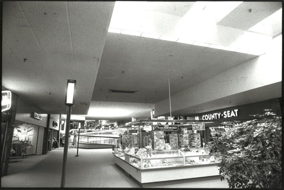 An old black and white photo of DeWitt's Shoppingtown Mall.